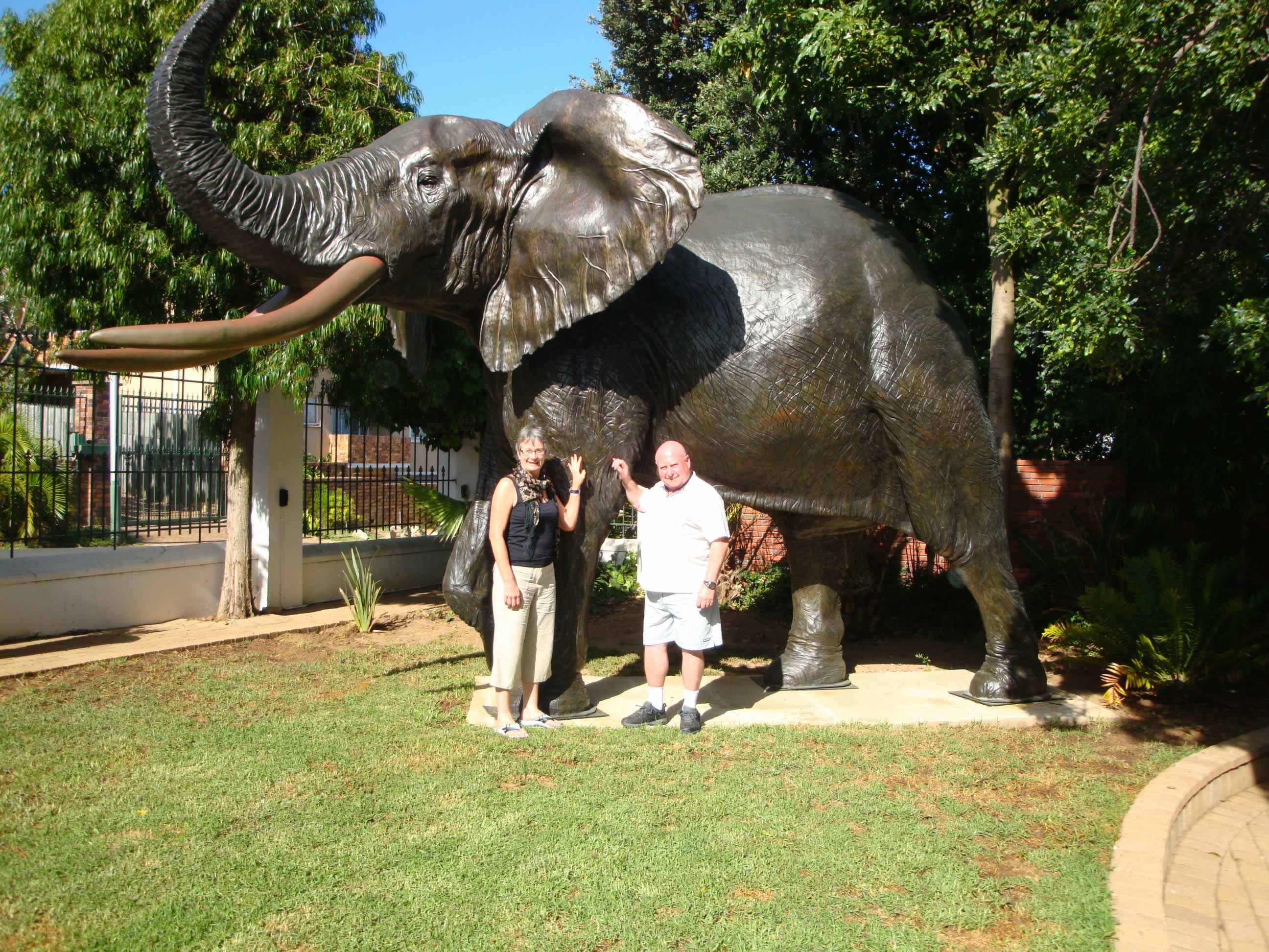 Jacky, John and bronze elephant in cousin Jean's SA garden